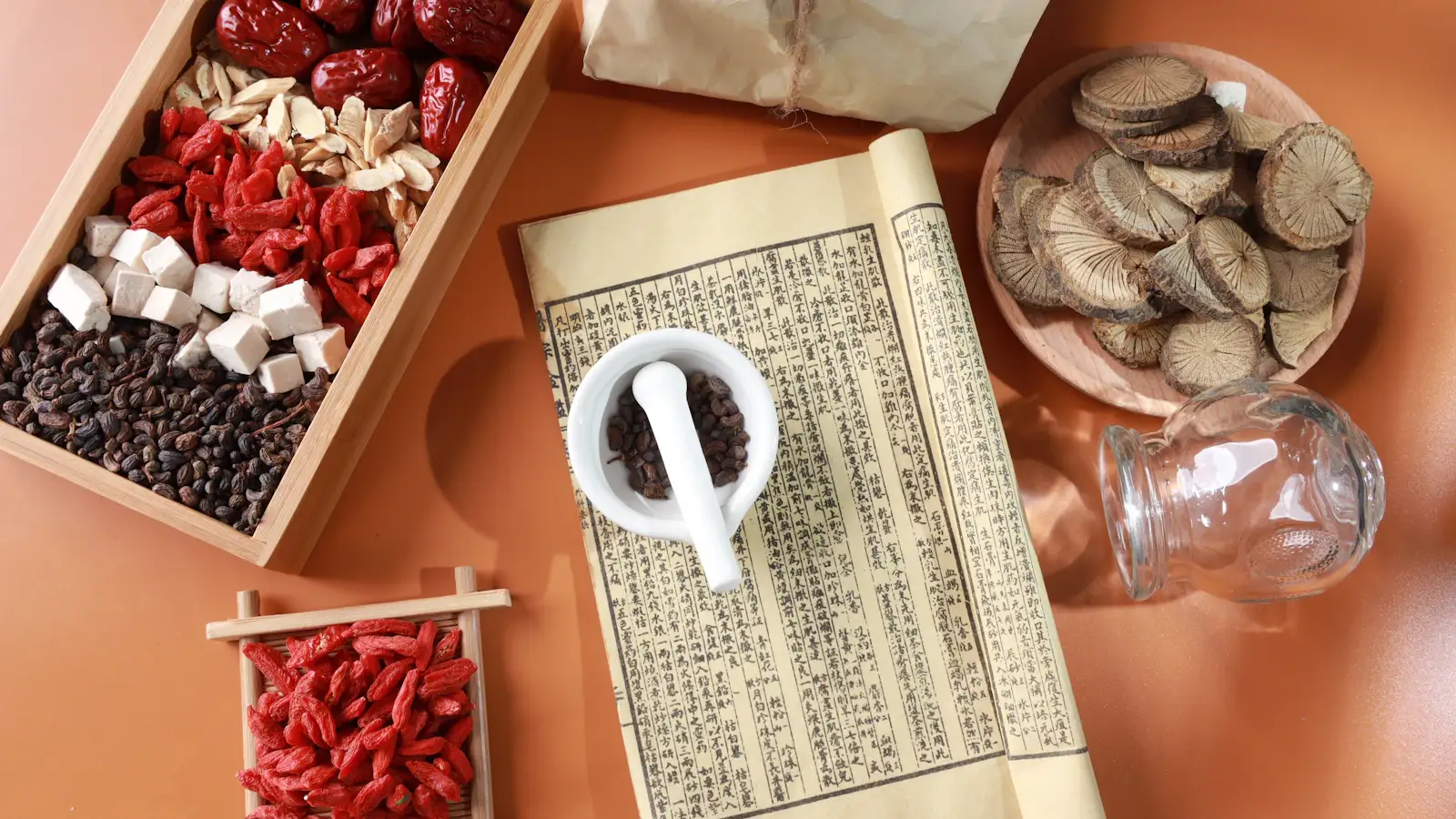 Traditional Chinese Medicine clinic with herbal medicine cabinet and consultation setup