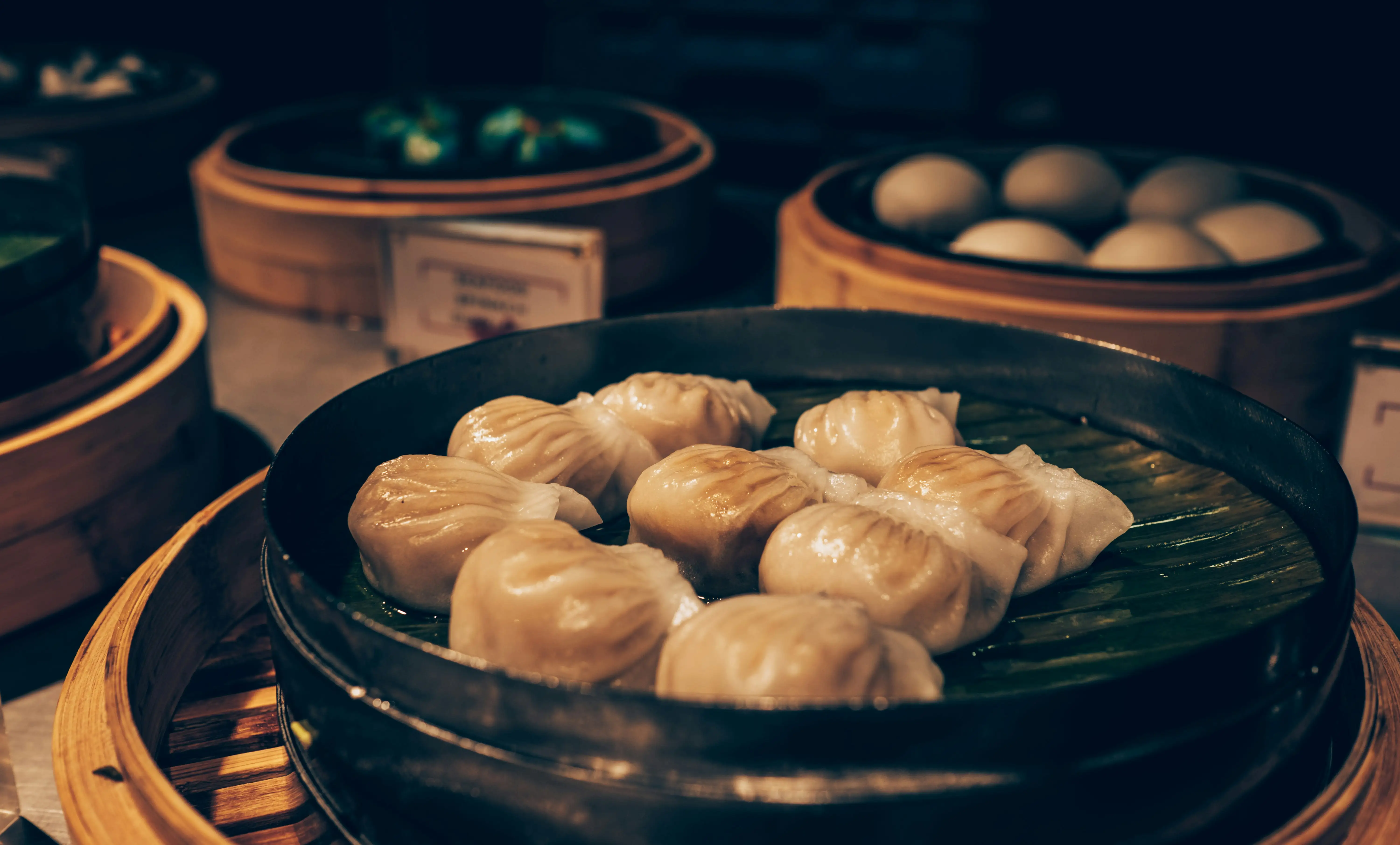 Spicy Sichuan street food dishes at a night market in China